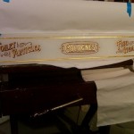 Gilded Glass Sign before black backing