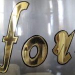 hand painted verre eglomise sign on giant glass jar for Brad Ford & Moore and Giles at DIFFA'S Dining by Design (Architecture Digest)